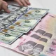 Dolar AS Tembus Rp18.000, Rupiah Kian Tertekan: Apa yang Terjadi?